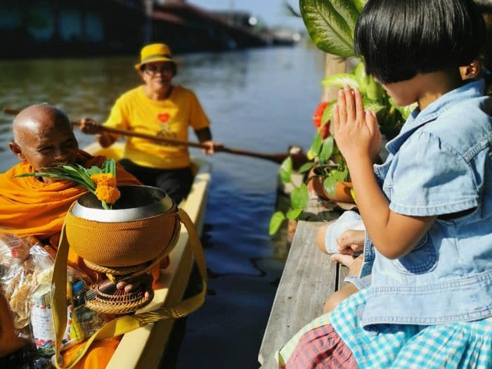 Buddhist Alms Offering Giving by Boat Amphawa